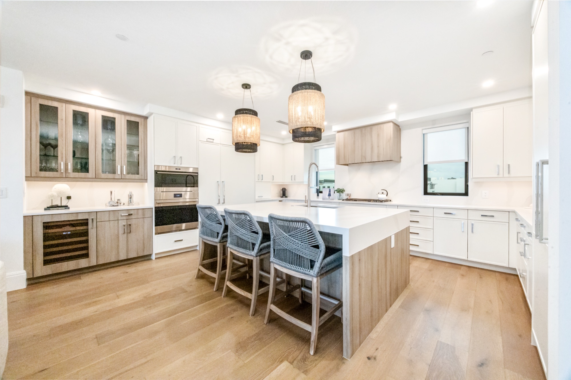 Chef's kitchen with Sub-Zero, Wolf, and Miele appliances, custom cabinetry